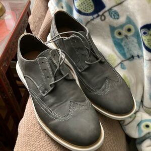 Gray Oxford style shoes